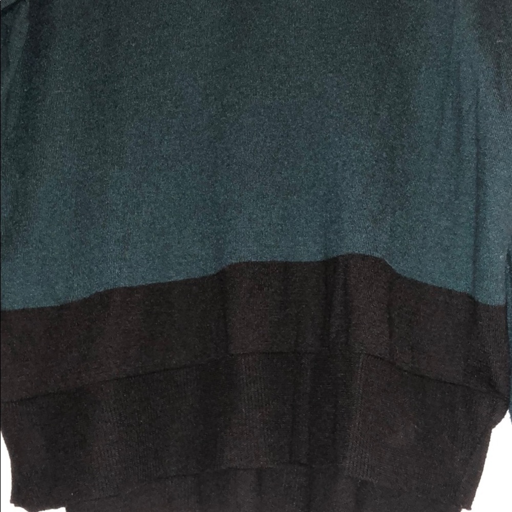 Green and black sweater. Worn in!